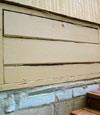 an old-fashioned crawl space door in Lake City about to be replaced