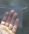 Closeup of a clear plastic covering on a Camden crawl space block wall