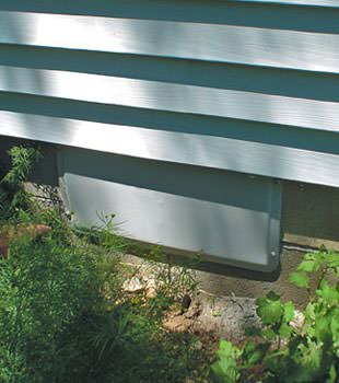 A gray crawl space vent cover in Murrells Inlet