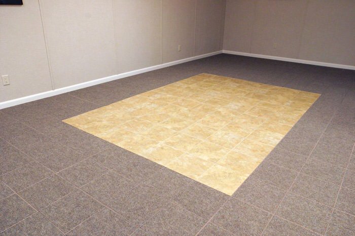 tiled and carpeted basement flooring installed in a North Myrtle Beach home