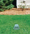 A buried gutter drain downspout extension installed in a Little River home